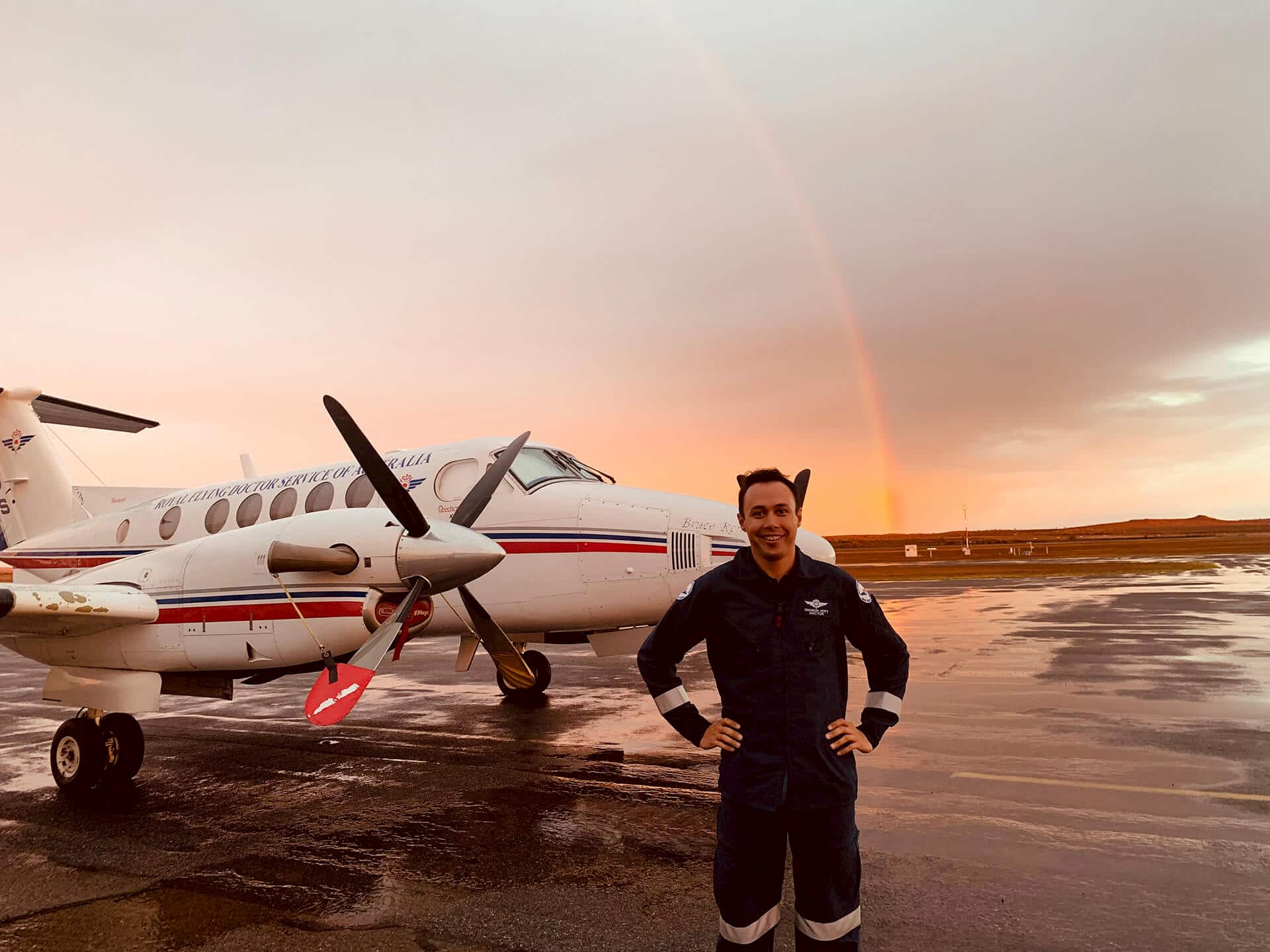 Dr Shannon Nott in front of Royal Flying Doctor Service plane